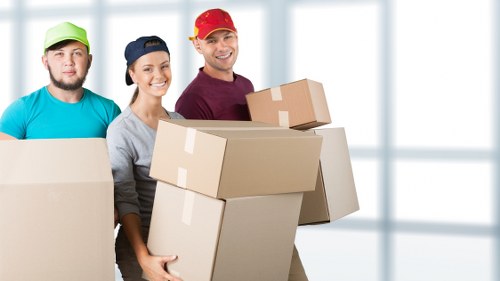 Fragile items being carefully wrapped during a move