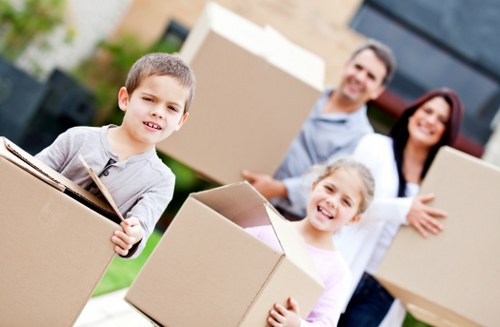 Careful unloading of boxes and furniture at a new Waterloo home