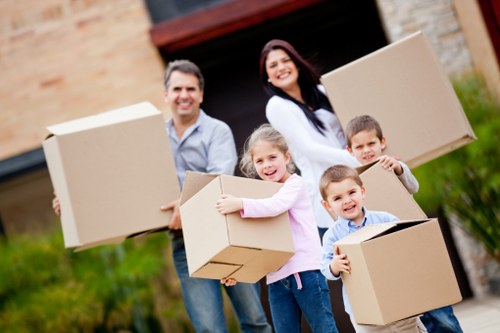 Packed moving boxes and furniture ready for transport in Waterloo